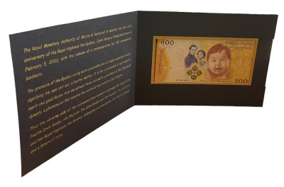 Бутан 100 нгултрумов 2016 1-ый год рождения принца  Гьялси Джигме Намгьела Вангчука, в оригинальном буклете Pick 37 a  бумага  UNC (пресс) 446-52-1