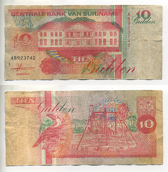 СУРИНАМ 10 ГУЛЬДЕНОВ 1991 9 ИЮЛЯ 1991, ЗДАНИЕ ЦЕНТРАЛЬНОГО БАНКА, ТУКАН Pick 137а бумага 7523-36-4